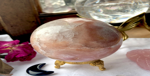 What are the functions and benefits of a pink crystal ball